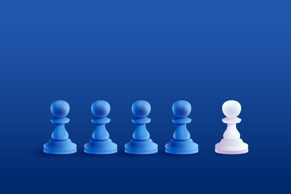 White chess pawn standing out from a row of blue pawns.
