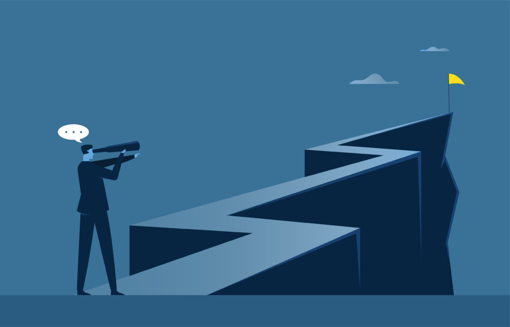Businessman scanning the path ahead toward a distant goal.